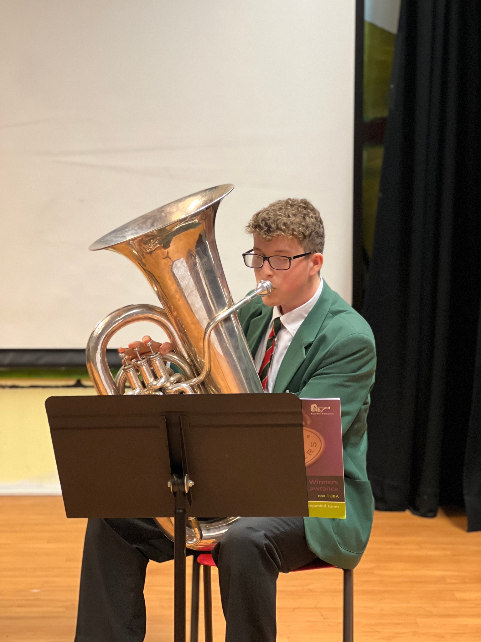 AGC House Music Boy playing tuba