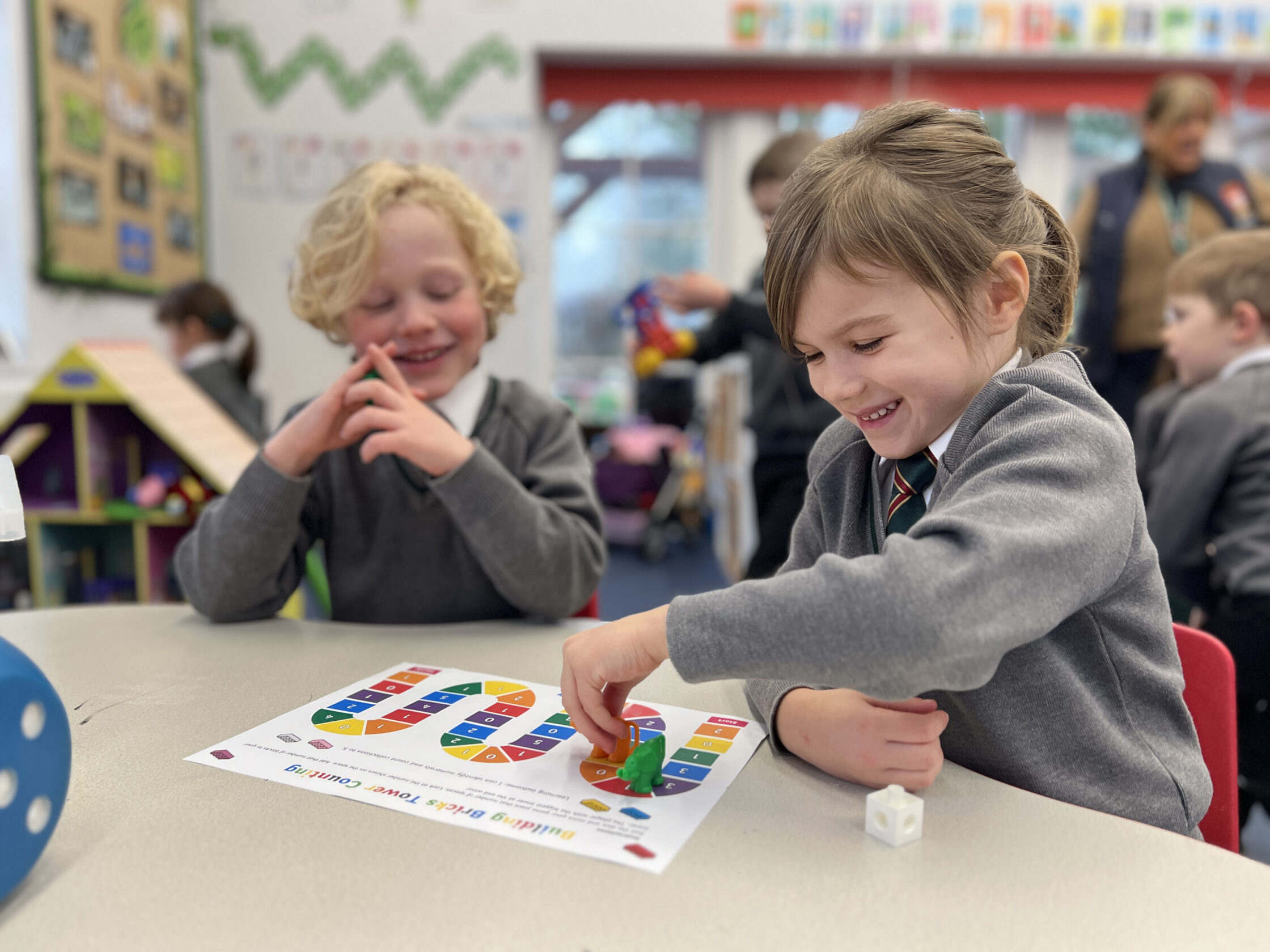 Two Foundation children playing a game